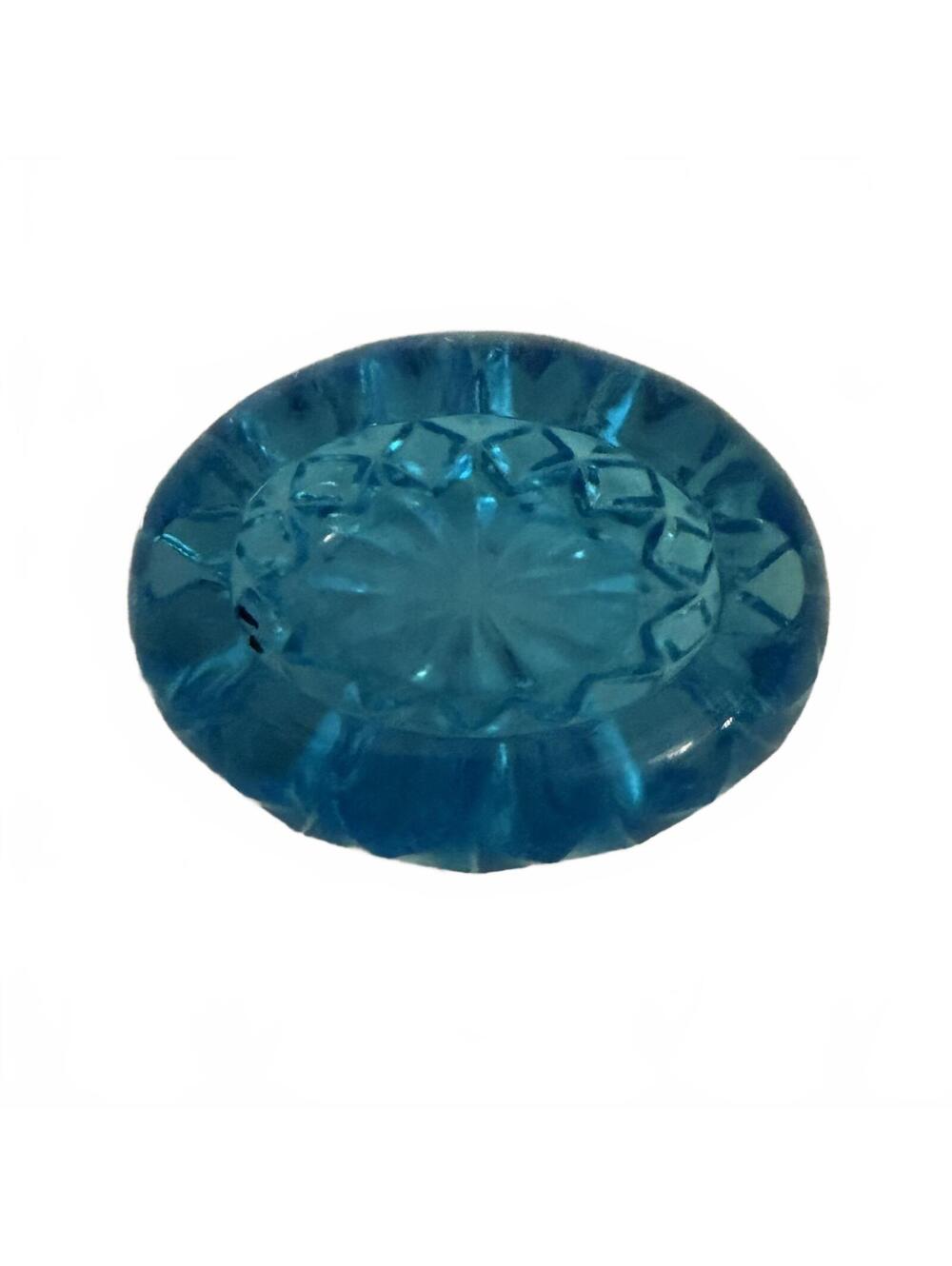 Vintage Indiana Glass blue glass relish dish with starburst pattern.
